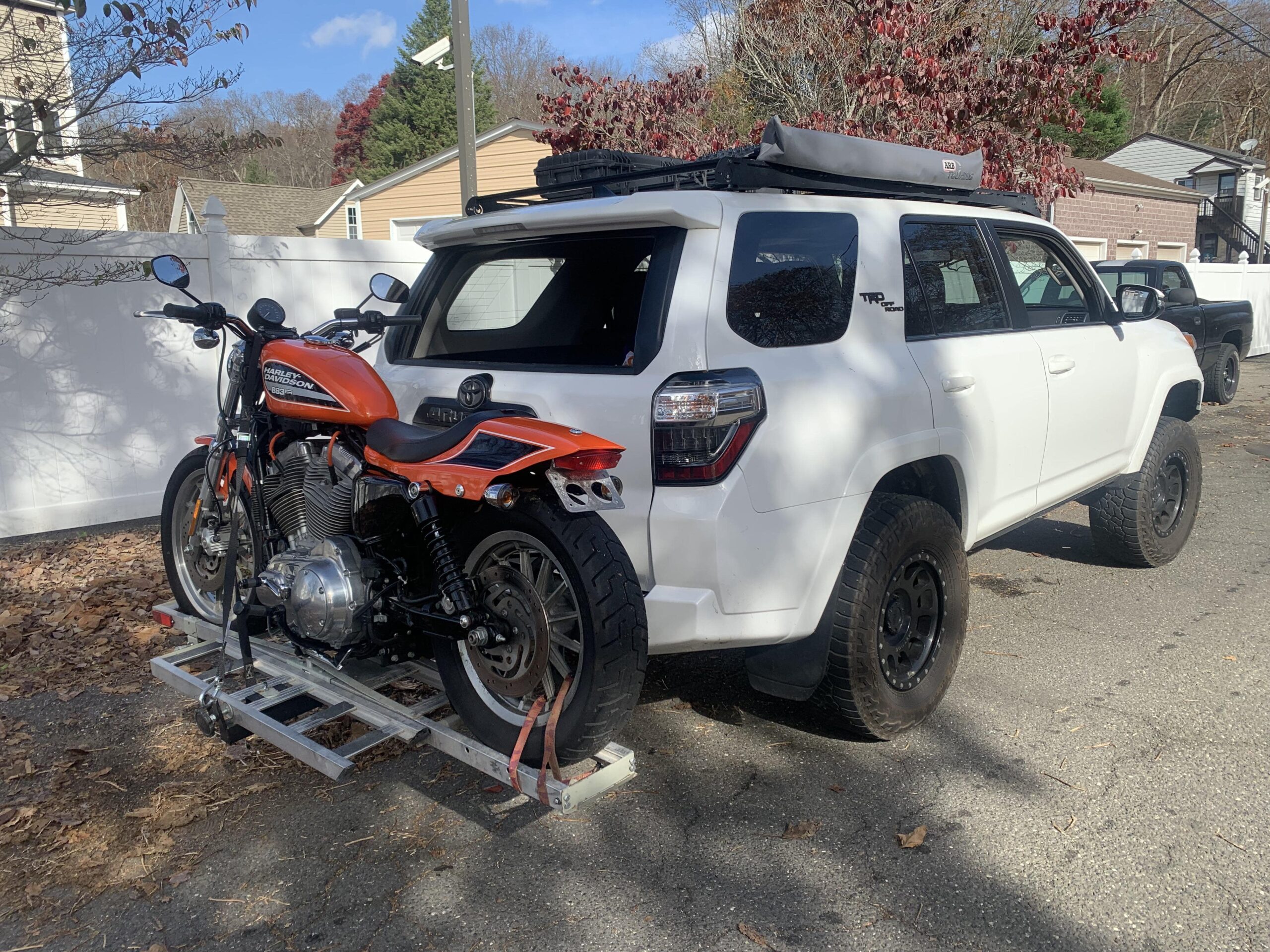 loading a dirt bike with a carrier
